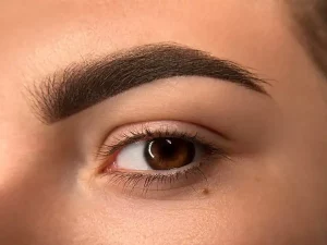 Permanent makeup brows created with precision to suit the client’s face shape, available at getBeauty Cambridge